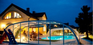 Telescopic swimming pool enclosure