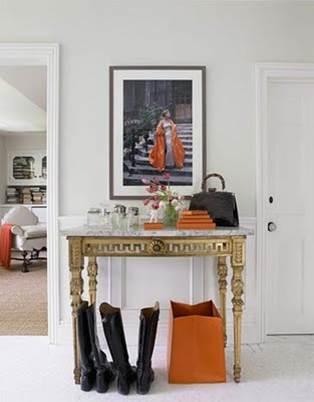Centre the picture over the furniture, and 4 to 6 inches above it.