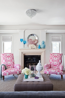 Twin Easy Chairs around a fireplace