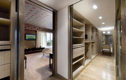 Another wardrobe behind headboard