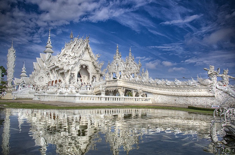 View of Wat Rong Khun, a Buddhist Temple in Chiang Rai, which is very popular amongst foreign tourists at the White Temple.