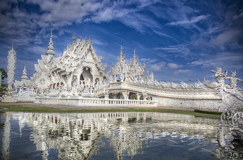 View of Wat Rong Khun,  a Buddhist Temple in Chiang Rai, which is very popular amongst foreign tourists at the White Temple.